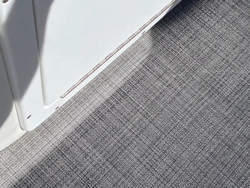 Slide: The Image of Close-up of 2023 JC Neptoon Sport 23TT boat deck with textured flooring. - 11