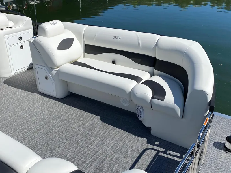 Slide: The Image of 2023 JC Neptoon Sport 23TT pontoon boat with plush seating and modern design. - 3