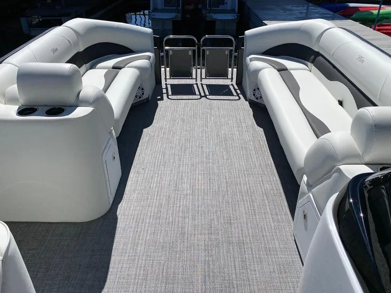 Slide: The Image of 2023 JC Neptoon Sport 23TT pontoon boat interior with spacious seating and modern design. - 6