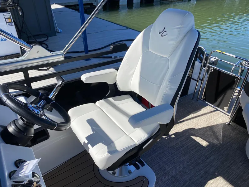 Slide: The Image of Captain's chair of the 2024 JC NEPTOON SPORT 21TT boat. - 10