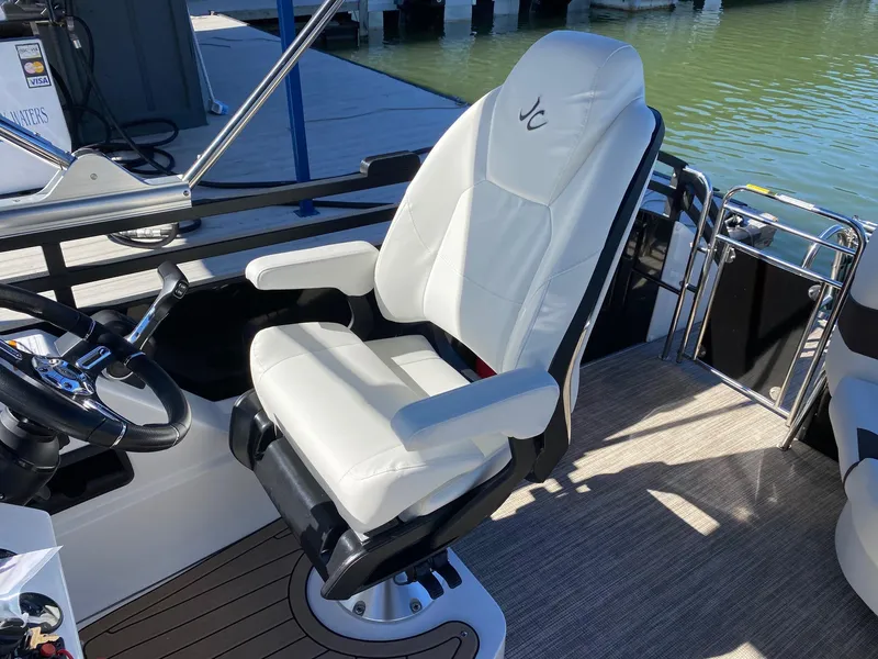 Slide: The Image of Captain's chair on the 2024 JC NEPTOON SPORT 21TT boat. - 11