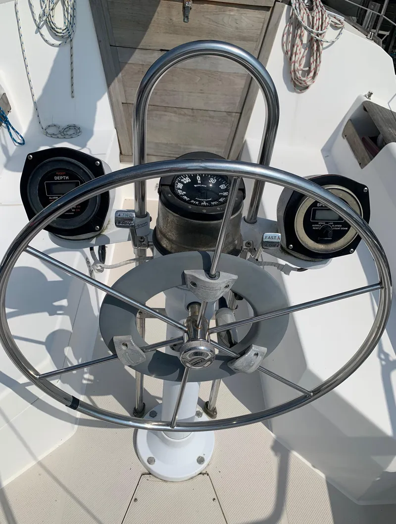 Slide: The Image of Steering wheel and instrument panel of a 1987 Catalina 30 Tall-Rig sailboat. - 13