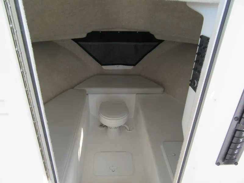 Slide: The Image of 2024 Parker 2820 XLD Sport Cabin interior with toilet and seating area. - 4