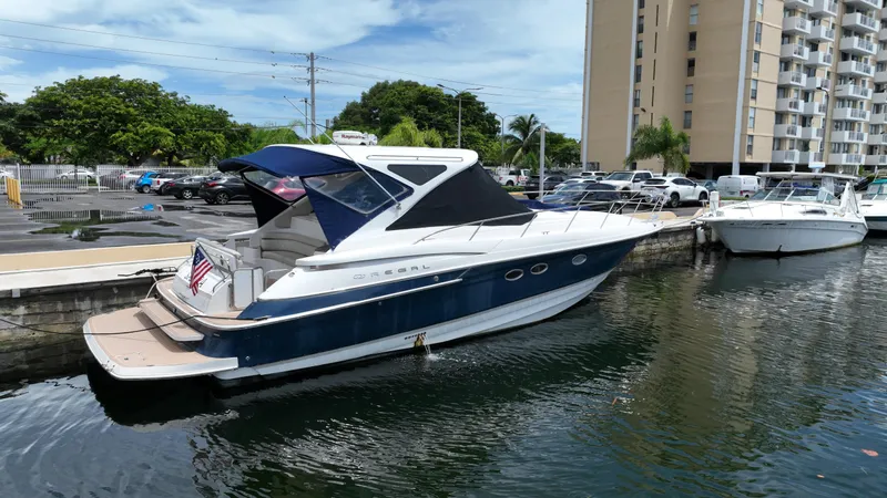 The Image of 2007 Regal 4460 Commodore yacht docked at marina. - 0