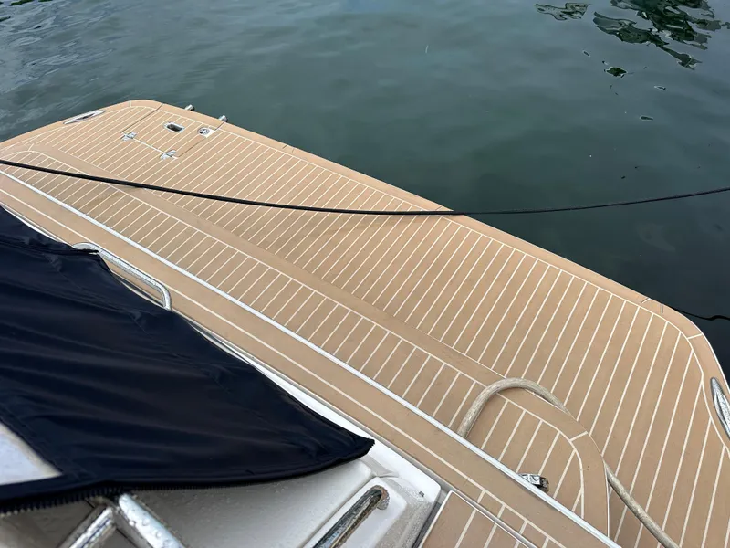 Slide: The Image of 2007 Regal 4460 Commodore swim platform with teak decking. - 13