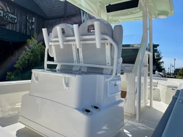 Slide: The Image of 2024 Ranger 2510 Bay boat interior with seating and console. - 3