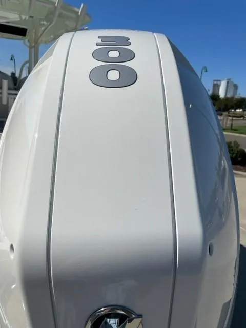 Slide: The Image of Close-up of 2024 Ranger 2510 Bay boat engine. - 7