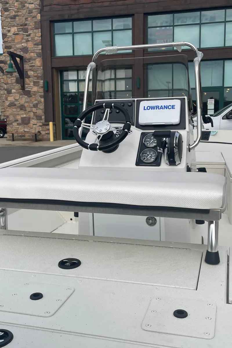 Slide: The Image of 2024 Ranger RB190 boat with Lowrance navigation system and modern console. - 3