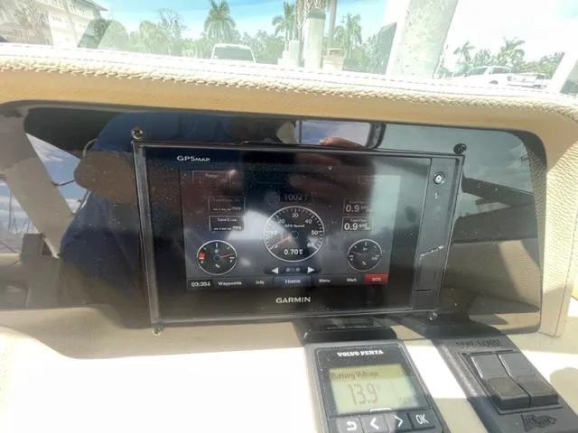 Slide: The Image of Garmin GPS display on 2016 Regal 26 Fastdeck boat dashboard. - 16