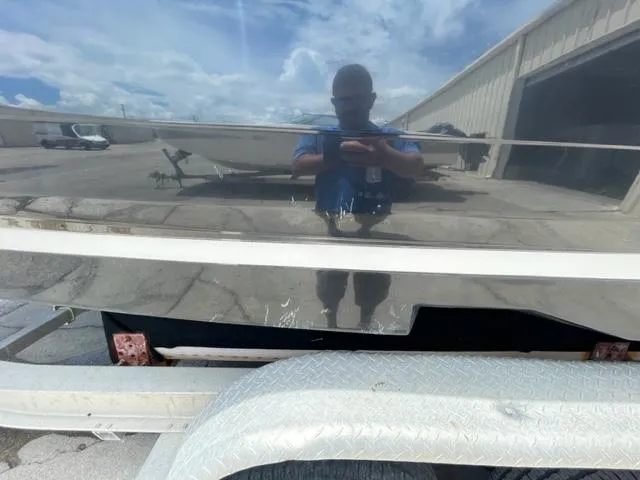 Slide: The Image of 2016 Regal 26 Fastdeck boat on trailer, reflecting surroundings. - 20