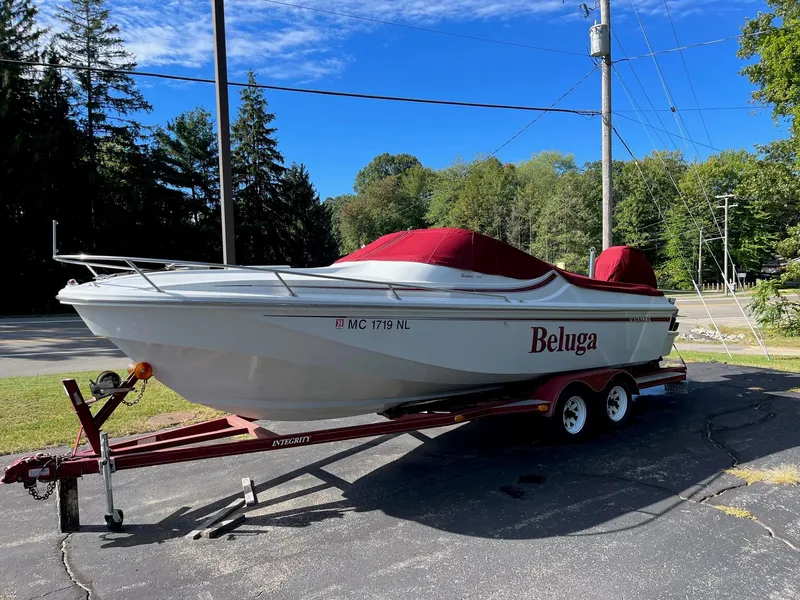 Slide: The Image of 1988 Boston Whaler Temptation 2200 boat named Beluga on a trailer. - 17
