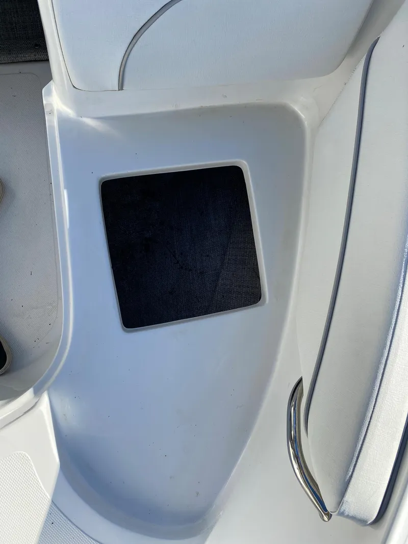 Slide: The Image of 2019 Caravelle 19 EBo Bowrider interior detail with storage compartment. - 12