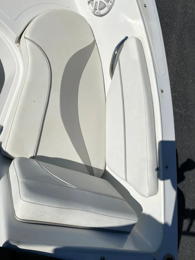 Slide: The Image of 2019 Caravelle 19 EBo Bowrider white cushioned seating. - 14