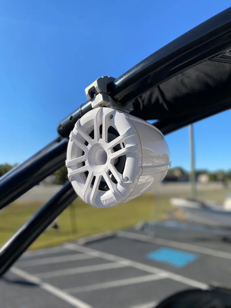Slide: The Image of Close-up of a speaker on a 2019 Caravelle 19 EBo Bowrider boat. - 19