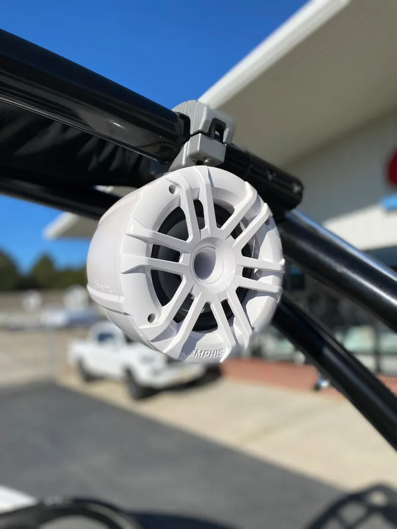 Slide: The Image of White speaker mounted on a 2019 Caravelle 19 EBo Bowrider boat. - 20