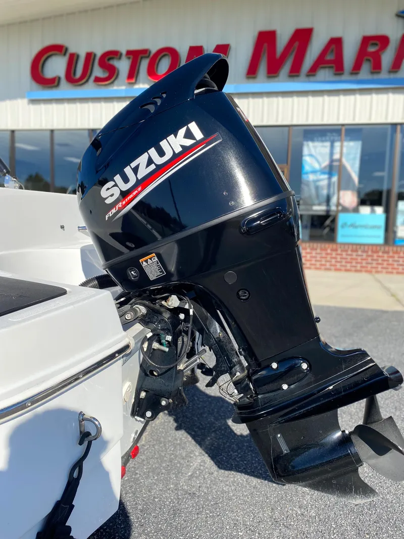Slide: The Image of 2019 Caravelle 19 EBo Bowrider with Suzuki outboard motor. - 24