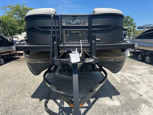 Slide: The Image of 2024 Barletta C24QC pontoon boat on a trailer, front view. - 3