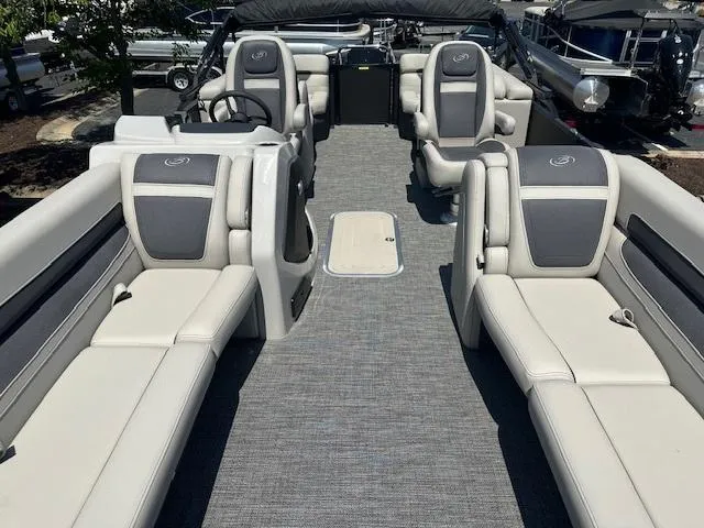 Slide: The Image of 2024 Barletta C24QC pontoon boat interior with luxurious seating and modern design. - 5
