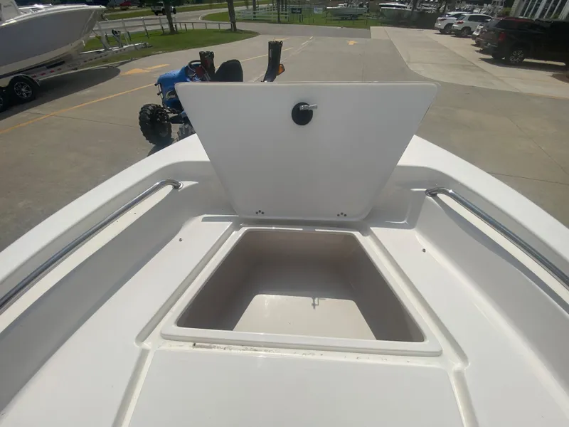Slide: The Image of 2024 Key West 189 FS boat with open storage compartment. - 21