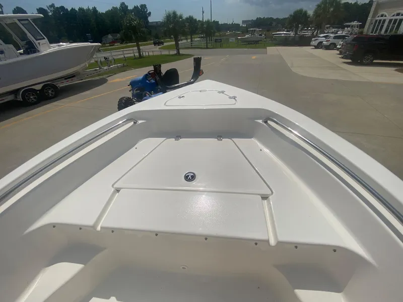 Slide: The Image of 2024 Key West 189 FS boat bow view in a marina. - 20