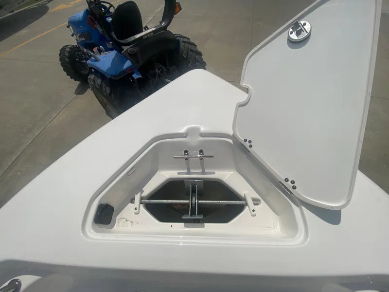 Slide: The Image of 2024 Key West 189 FS boat anchor compartment with open hatch. - 23