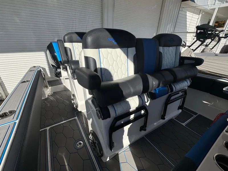 Slide: The Image of 2024 Fountain 34 SC boat interior with luxurious seating and modern design. - 13