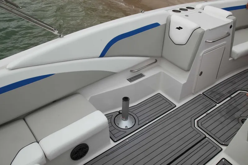 Slide: The Image of 2024 Starcraft SVX 231 OB DH boat interior with seating and storage compartments. - 10