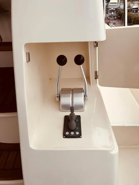 Slide: The Image of Control panel of a 2008 Hampton Command Bridge yacht. - 13