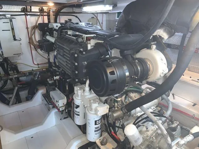 Slide: The Image of Engine room of a 2008 Hampton Command Bridge yacht with CAT engine. - 18