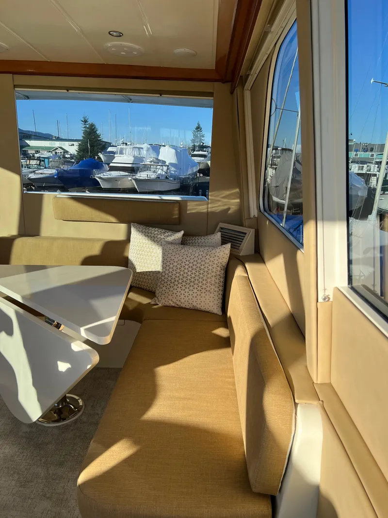 Slide: The Image of Interior of a 2008 Hampton Command Bridge yacht with marina view. - 23