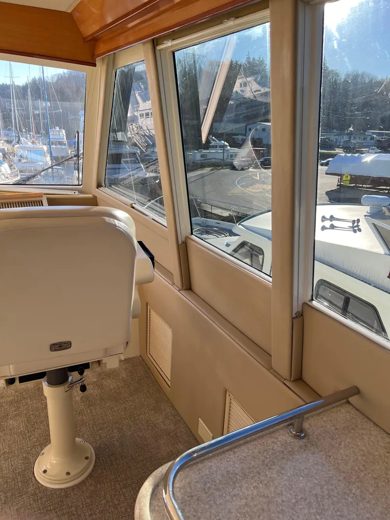 Slide: The Image of Interior view of 2008 Hampton Command Bridge yacht helm station. - 34
