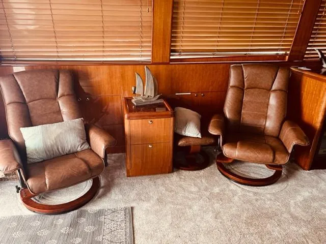 Slide: The Image of Two leather chairs in the 2008 Hampton Command Bridge yacht interior. - 4