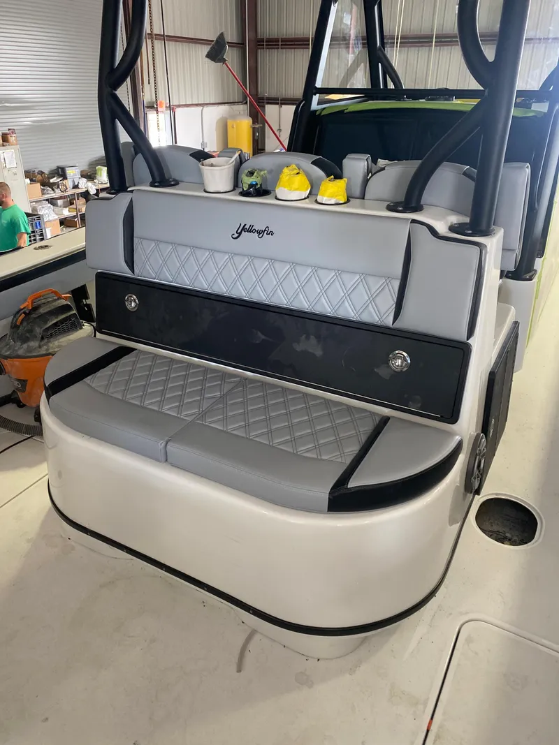 Slide: The Image of 2022 Yellowfin 39 boat interior with cushioned seating. - 17