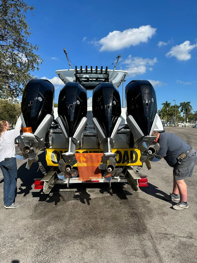 Slide: The Image of 2022 Yellowfin 39 boat with four outboard motors on a trailer. - 5