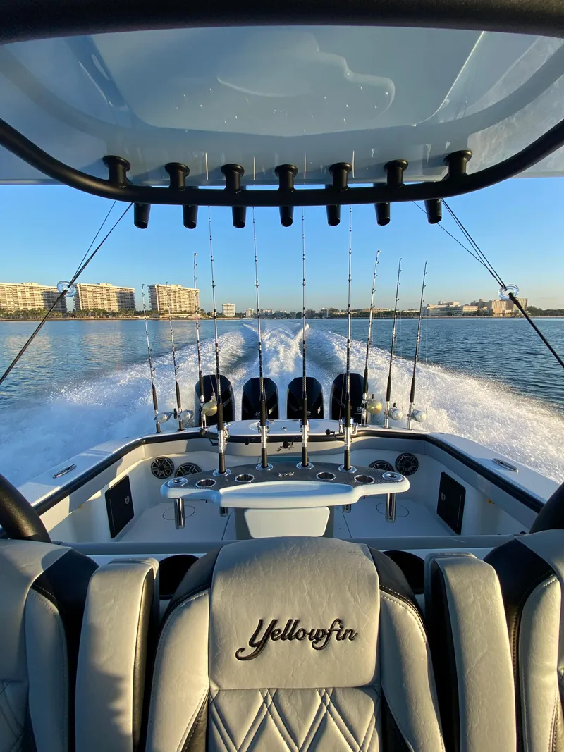 Slide: The Image of 2022 Yellowfin 39 boat with fishing rods on a sunny day. - 8