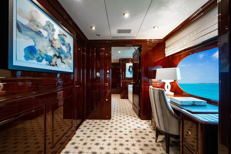 Slide: The Image of Luxurious interior of 2008 Christensen Tri-Deck Motor Yacht with elegant wood paneling and ocean view. - 10