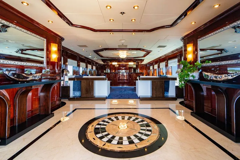 Slide: The Image of Luxurious interior of 2008 Christensen Tri-Deck Motor Yacht with elegant wood finishes and modern decor. - 2