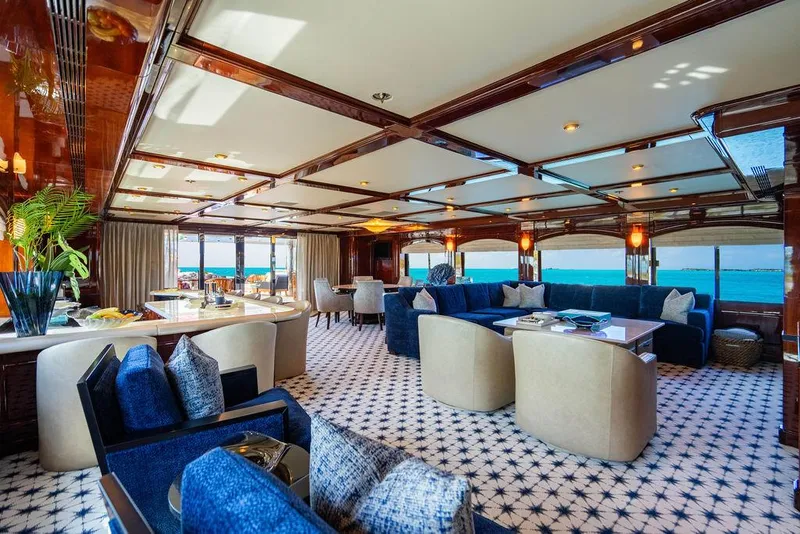 Slide: The Image of Luxurious interior of 2008 Christensen Tri-Deck Motor Yacht with elegant seating and ocean views. - 22
