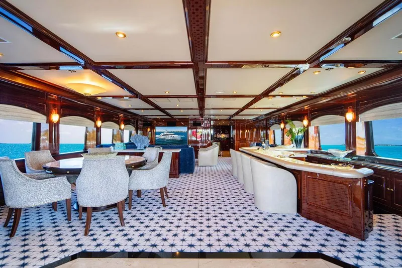 Slide: The Image of Luxurious interior of 2008 Christensen Tri-Deck Motor Yacht with elegant dining and lounge areas. - 23