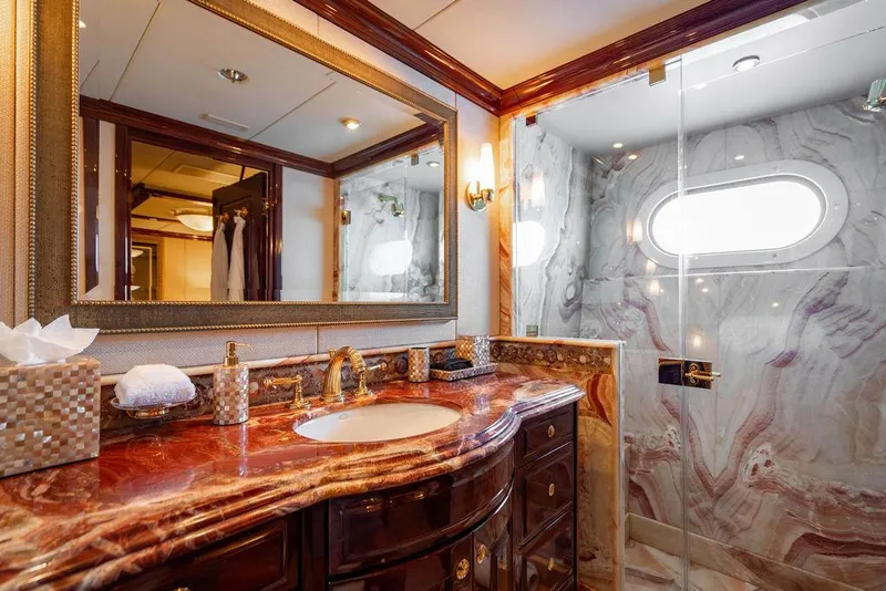Slide: The Image of Luxurious bathroom on 2008 Christensen Tri-Deck Motor Yacht with marble countertop and elegant fixtures. - 32