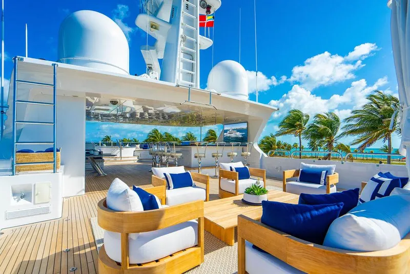 Slide: The Image of Luxurious 2008 Christensen Tri-Deck Motor Yacht with elegant outdoor seating and ocean view. - 40