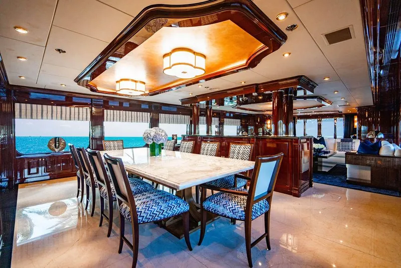 Slide: The Image of Luxurious dining area on 2008 Christensen Tri-Deck Motor Yacht with elegant furnishings and ocean view. - 6