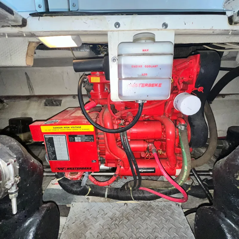 Slide: The Image of 2002 Regal Commodore 3880 engine compartment with Westerbeke generator. - 30