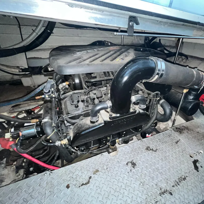 Slide: The Image of Engine compartment of a 2002 Regal Commodore 3880 boat. - 34