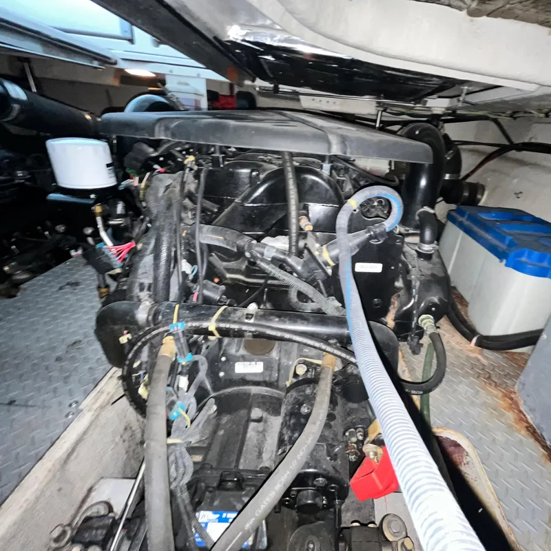 Slide: The Image of Engine compartment of a 2002 Regal Commodore 3880 boat. - 35