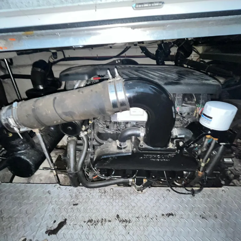 Slide: The Image of Engine compartment of a 2002 Regal Commodore 3880 boat. - 36