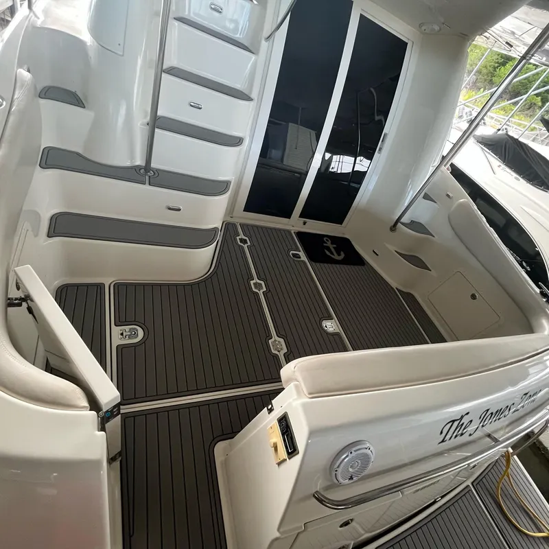 Slide: The Image of 2002 Regal Commodore 3880 boat interior with steps and sliding glass doors. - 6
