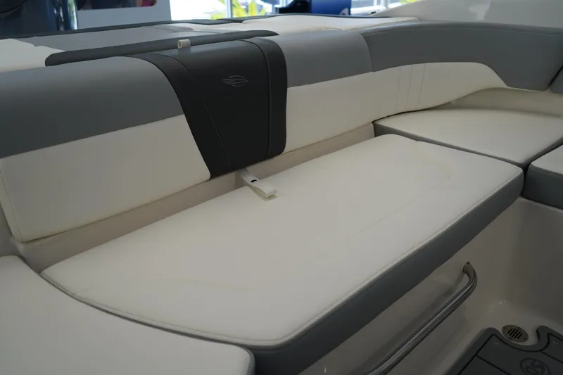 Slide: The Image of 2024 Chaparral 23 SSi OB boat interior seating with sleek, modern design and comfortable upholstery. - 11