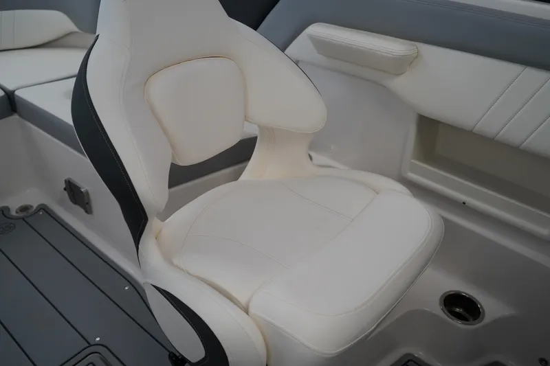 Slide: The Image of 2024 Chaparral 23 SSi OB boat seat, white upholstery, modern design. - 18