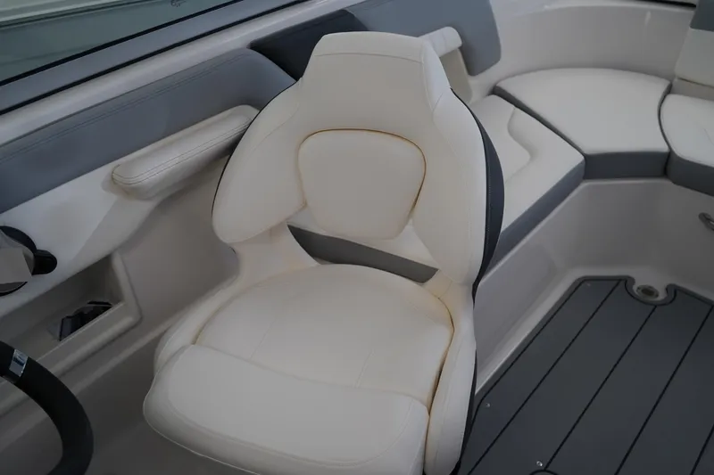 Slide: The Image of 2024 Chaparral 23 SSi OB boat interior with plush seating and modern design. - 23